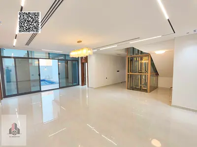Corner villa for sale with a swimming pool and an elevator