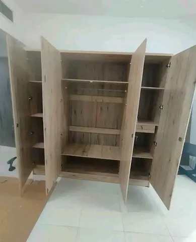Large wooden 4-door wardrobe with shelves and hanging rail - good condition