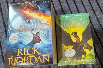 Rick Riordan boxed set: Heroes of Olympus - The Lost Hero + Percy Jackson paperback (new)
