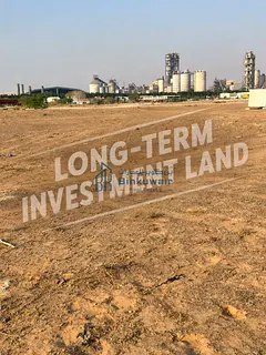 For long-term investment | Industrial land in Al Sajaa, second plot from Emirates Road (Al-Abir Road