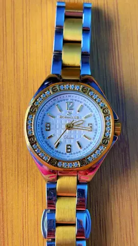 Two-tone women's wristwatch with crystal bezel (working condition)