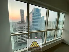2 master bedrooms, separate hall, 3 baths, balcony, parking & central AC. Al Rashidiya 3 near Grand 