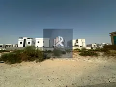 Land for sale in Al-Houshi — located on the main road, perfect for building your villa. Prime loca