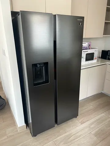Side by side door refrigerator neat and clean condition