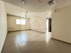Spacious 1-Bedroom Apartment in Al Majaz 1 with Free AC, Open-View Kitchen, Two Bathrooms, Parking, 