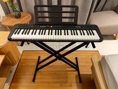Casio 61-Key Portable Keyboard with Stand - perfect Condition, including charging cable