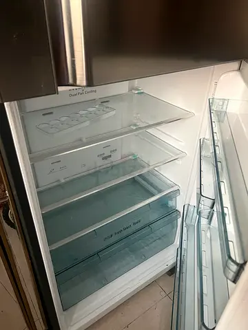 Used double-door refrigerator in good condition