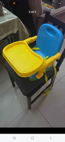 Portable clip-on booster seat with tray — blue/yellow