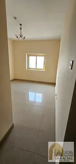Two-bedroom apartment with a living room for rent in Al Qasimia (Al Nad), Sharjah. Features include