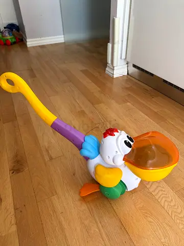 Musical Walking Pelican Push Toy for Toddlers (Speaks Russian)