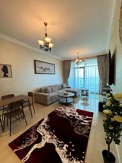 Luxury one-bedroom apartment with a sea view for monthly rent 🏡 at Corniche Residence Towers, Ajm