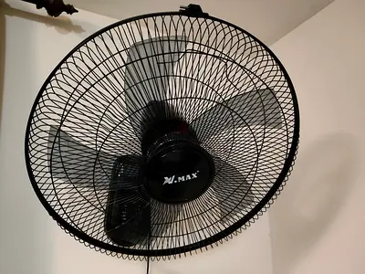 Wall-mounted Max brand oscillating fan - good working condition