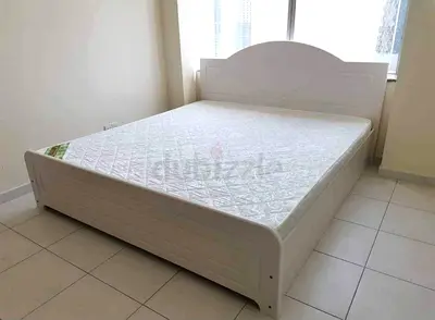 BRAND NEW KING SIZE WOOD BED WITH MATTRESS AVAILABLE