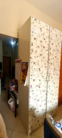 Two-door floral wardrobe / armoire in good used condition