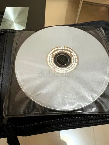 Case Logic CD Wallet with 12 Music CDs: Notorious B.I.G., Belinda Carlisle, Phil Collins and More