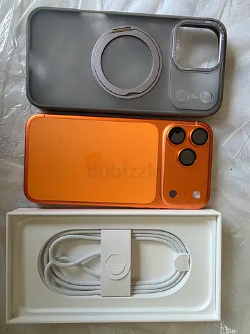 Used Orange Apple iPhone with Case and USB-C to Lightning Cable