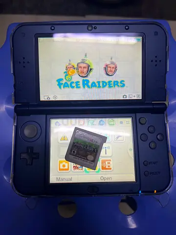 Nintendo 3DS XL with Face Raiders + mine craft game