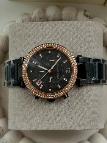 Michael kors, black and rose gold Watch for sale.