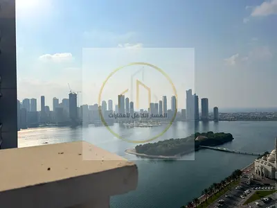 شقة غرفتين وصالة للايجار السنوي في منطقة المجاز 1 الشارقة تكييف مجاني باركن مجاني جيم ومسبح مجاني بلكونة اطلالة بحرية غرفة ماستر مساحة واسعةتشطيب حديث