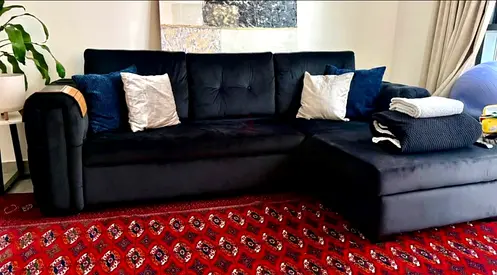 Black L-shaped Sofa Bed - Very Good Condition