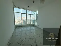 Two bedrooms, a large living room, air conditioning, a balcony, a gym, a swimming pool, a garden, an