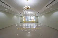 4-bedroom apartment with a living room for annual rent in Al Qasba; includes free air conditioning, 
