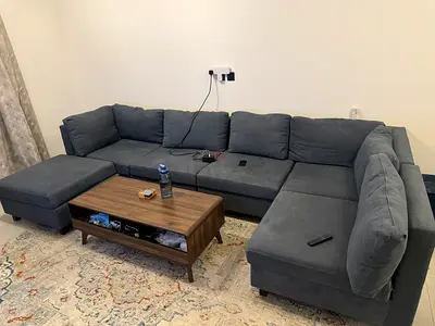 Large L-shaped Grey Fabric Sofa with Ottoman - Good Condition and coffee table