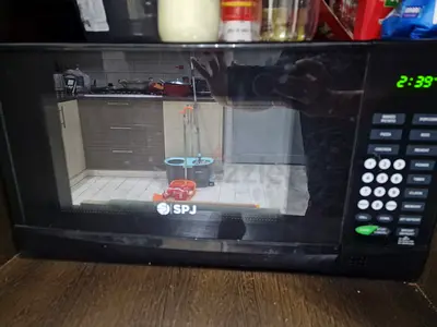 SPJ Countertop Microwave Oven - Used, Working