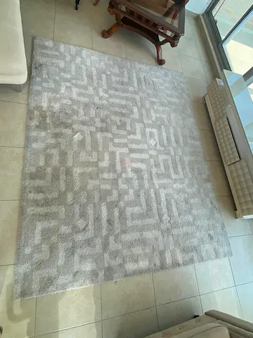 Light grey geometric area rug - good condition