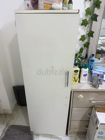 Slim white single-door wardrobe / storage cabinet - good condition