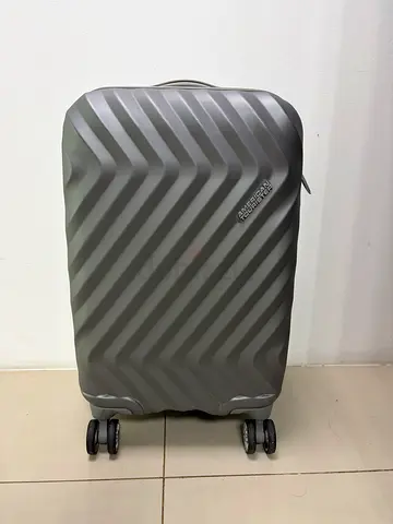 American Tourister Zavis 55cm. Hard Shell 4-Wheel Carry-On Suitcase - Grey
