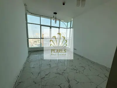 غرفتان وصالة للإيجار السنوي في أبراج الواحة بالراشدية 1، طابق عالٍ بإطلالة بحرية رائعة، صالة منفصلة وبلكونة وموقع مميز