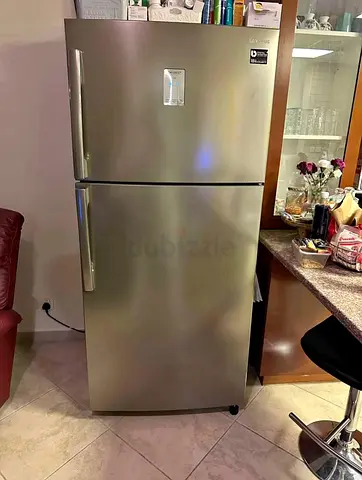 Samsung refrigerator 720 liter capacity top mount freezer same like a new condition