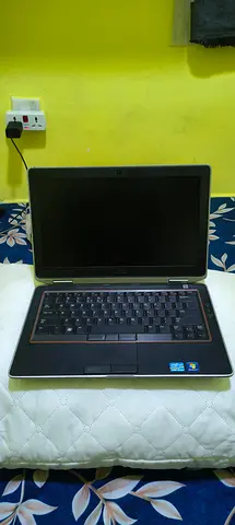 Used Dell Latitude laptop old model with original charger, good work condition need replace battery.