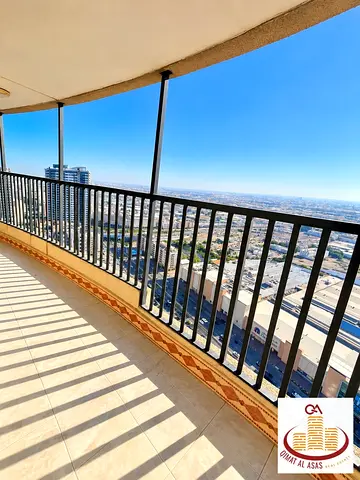 Three bedrooms and a living room for annual rent in Al Majaz 2 area + a big balcony for 57,000
