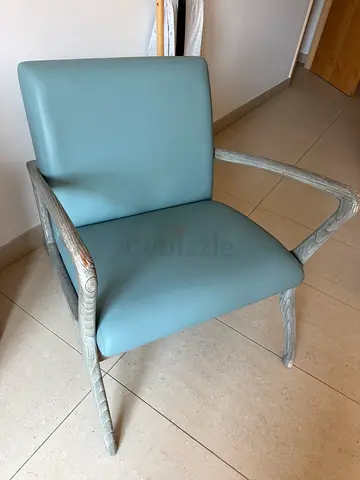 Light blue leather armchair with whitewashed wooden frame - good condition.