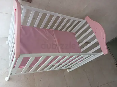 White and Pink Baby Crib / Cot with out Mattress - Good Condition