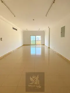 Spacious 3-bedroom apartment for rent in Abu Shagara, Sharjah, featuring a large living room, 1 mast