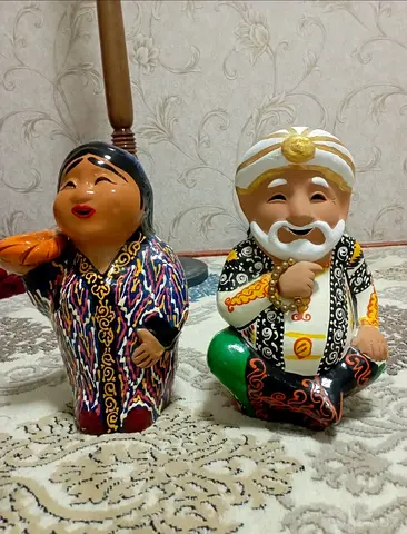 Pair of Hand-Painted Ceramic Figurines — Traditional Characters