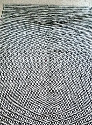 Used grey patterned area rug - medium size