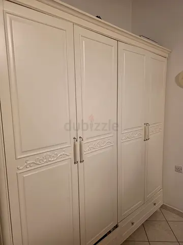 Large white ornate 4-door solid woodwardrobe / armoire - good condition