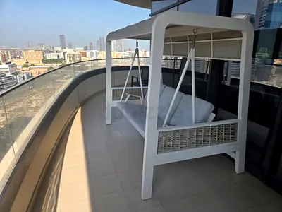 This piece of furniture is a 3-seater patio canopy swing (often referred to as a porch swing, garden