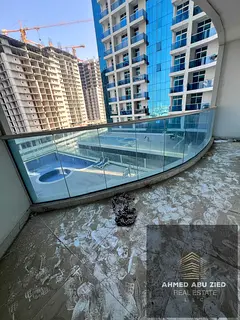 Annual Rent in Al Rashidiya 1, Al Waha Towers, Ajman. 1 master bedroom, 2 bathrooms, kitchen, 2 balc