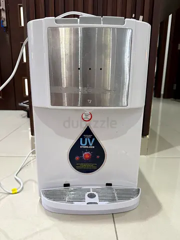 Used freestanding water cooler dispenser with UV sterilizer