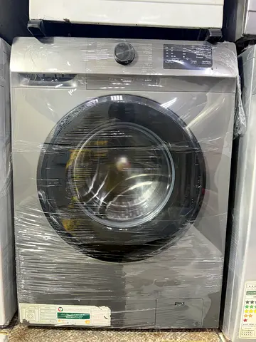 Front-load washing machine - stainless steel, good condition