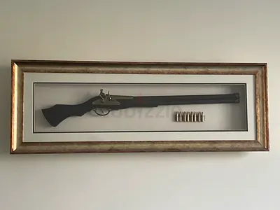 Framed Antique-Style Flintlock Rifle Display with Bullets