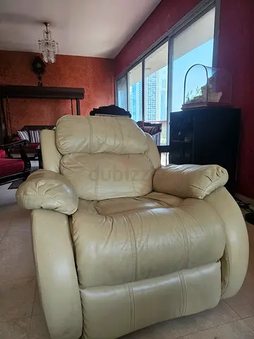 Cream leather recliner armchair in good used condition