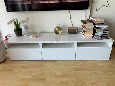 Low white TV cabinet with storage drawers - modern, good condition