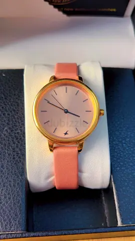 Gold-tone women's wristwatch with pink leather strap