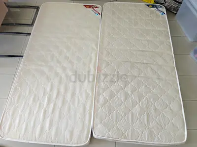 Two single mattresses - lightly used, clean and comfortable. Take both for 100